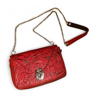 Red and black faux vegan leather crossbody bag with silver hardware